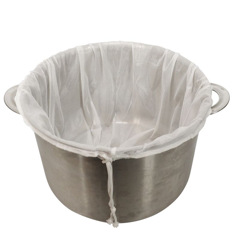 Mäskäyspussi 80 x 55 cm kiinnitettynä kattilaan kiristysnarun avulla