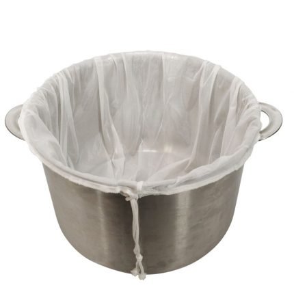 Mallaspussi olutkattilan ympärillä